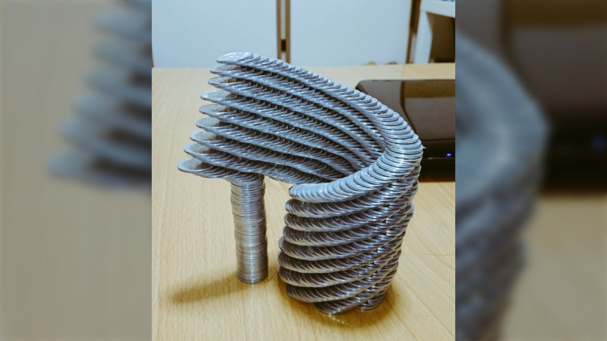 1円玉で作った超絶クオリティのコインタワー！その他、思わず崩したくなるコインタワーの数々 - Togetter